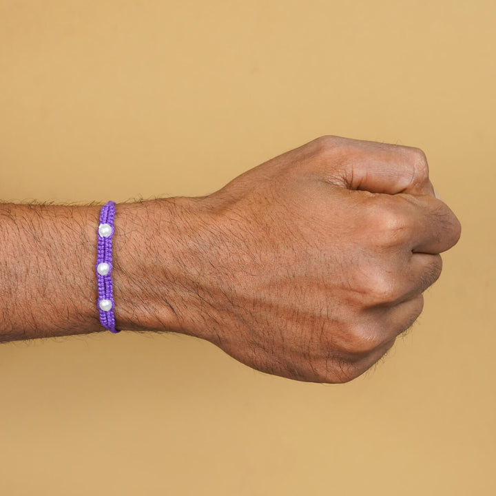 Handmade Macrame Three Pearl Rakhi With Roli Chawal - On Wrist View (20)