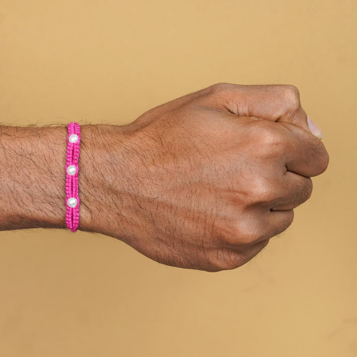 Handmade Macrame Three Pearl Rakhi With Roli Chawal - On Wrist View (16)