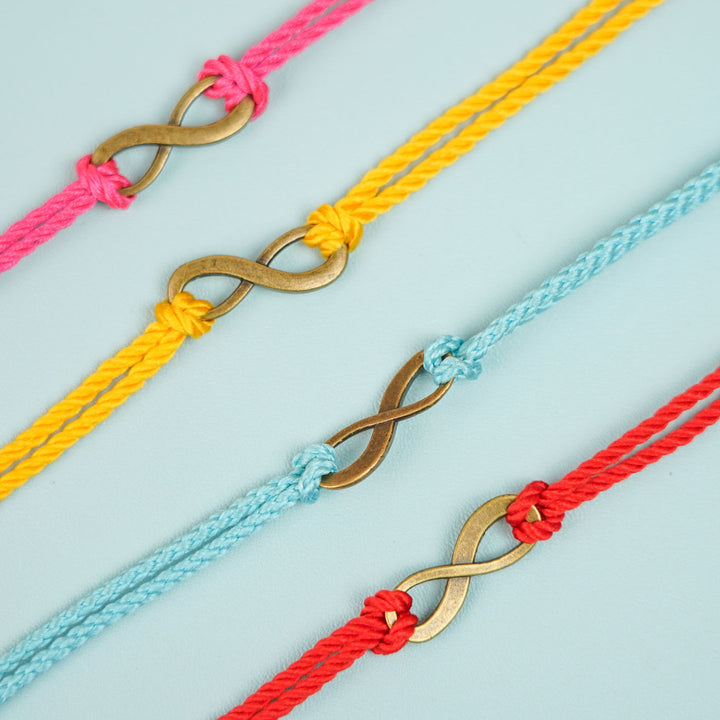 Handmade Minimalist Infinity Rakhi With Roli Chawal - Multiple Color Variations Display