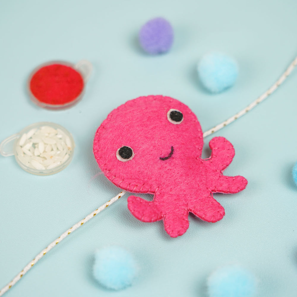 Customized Handmade Beaded Octopus Theme Felt Rakhi With Roli Chawal For Kids - Pink Octopus Close-up with Paint