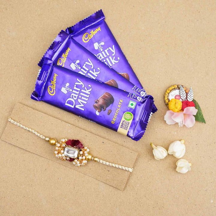 Handmade Large Kundan Stone Pearl Rakhi With Roli Chawal - Rakhi with chocolate gift arrangement