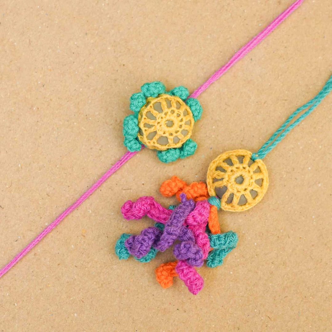 Eco Friendly Handmade Plantable Octopus Theme Kids Rakhi And Lumba With Roli Chawal - Close-up of two rakhi designs