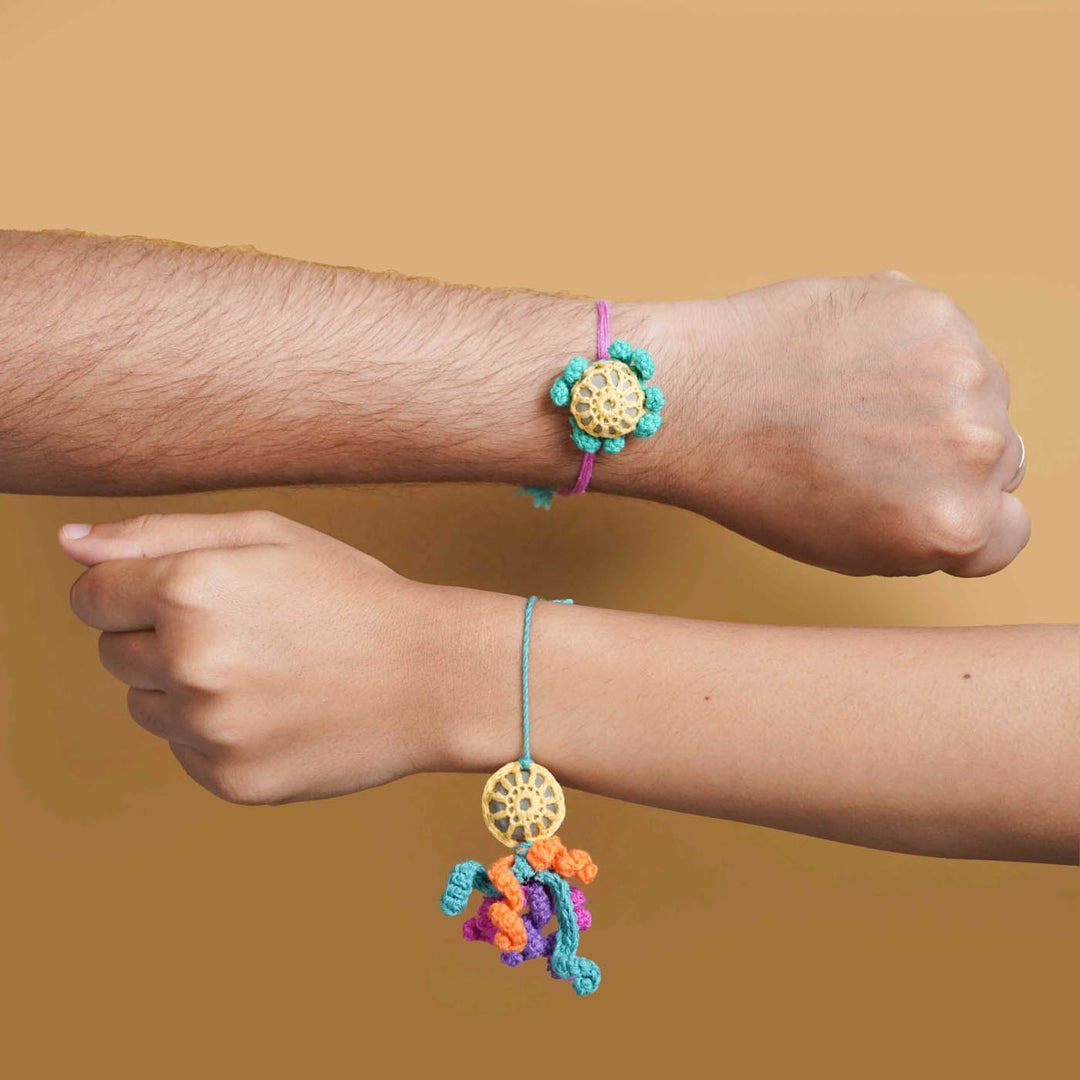 Eco Friendly Handmade Plantable Octopus Theme Kids Rakhi And Lumba With Roli Chawal - Wrist view showing rakhi worn