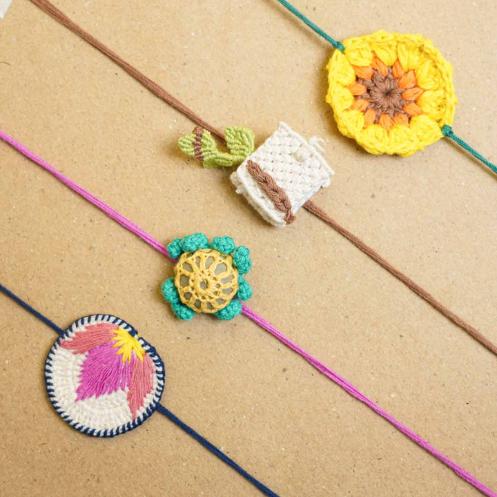 Eco Friendly Handmade Plantable Frog Theme Kids Rakhi With Roli Chawal - Multiple Crochet Charms Display