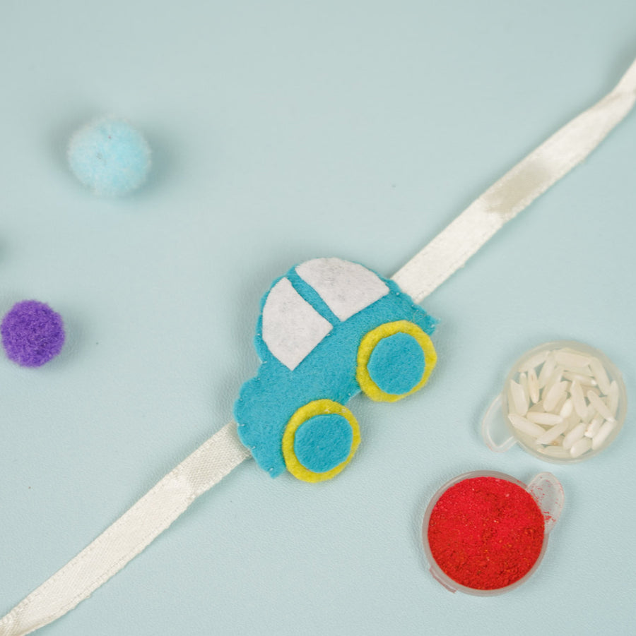 Handmade Teal Blue Car Theme Felt Kids Rakhi - Close-up of Car Design on Ribbon
