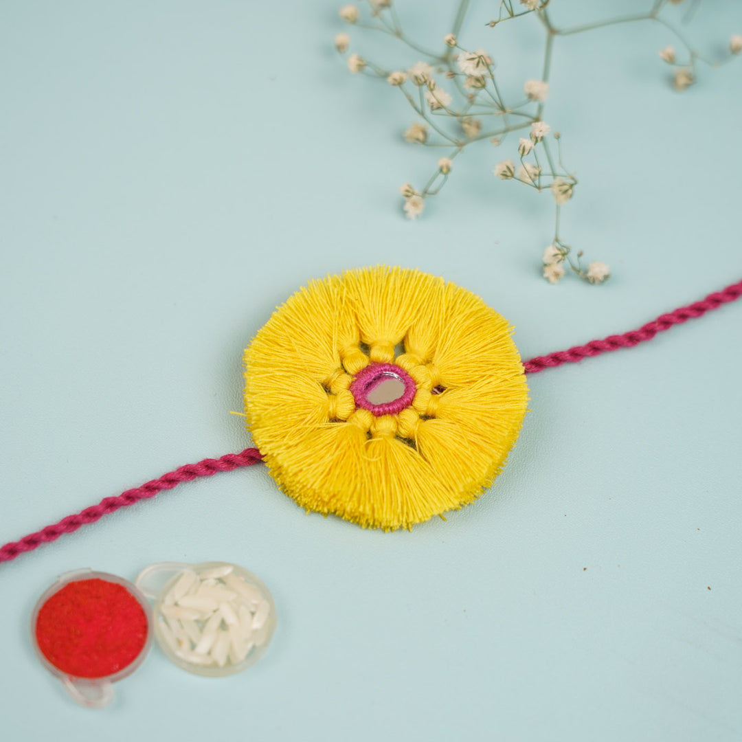 Handmade Pom Pom Design Fabric Rakhi For Brother - Full View with Color Powders