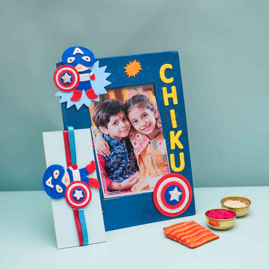 Personalized Handmade Captain America Theme Felt Kids Rakhi And Photo Frame Combo For Brother Set Of 2 - Photo Frame with Rakhi and Gifts