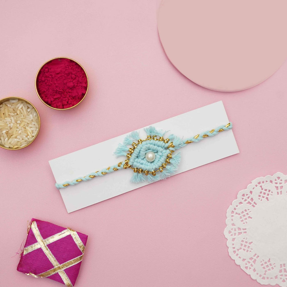 Handmade Macrame Pearl Evil Eye Design Cotton Kids Rakhi With Chocolates And Roli Chawal - Bracelet on Display Card