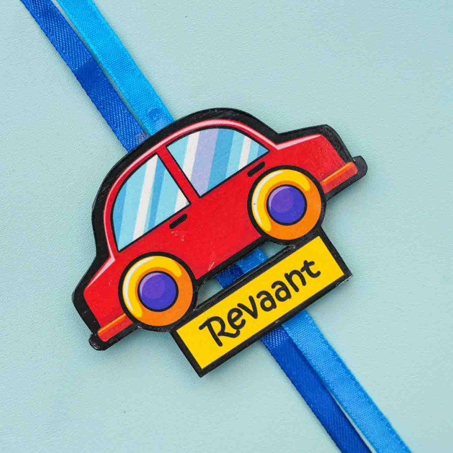 Personalized Reusable X Large Red Car Mdf Wood Rakhi With Chocolates And Roli Chawal - Close-up of Car Design