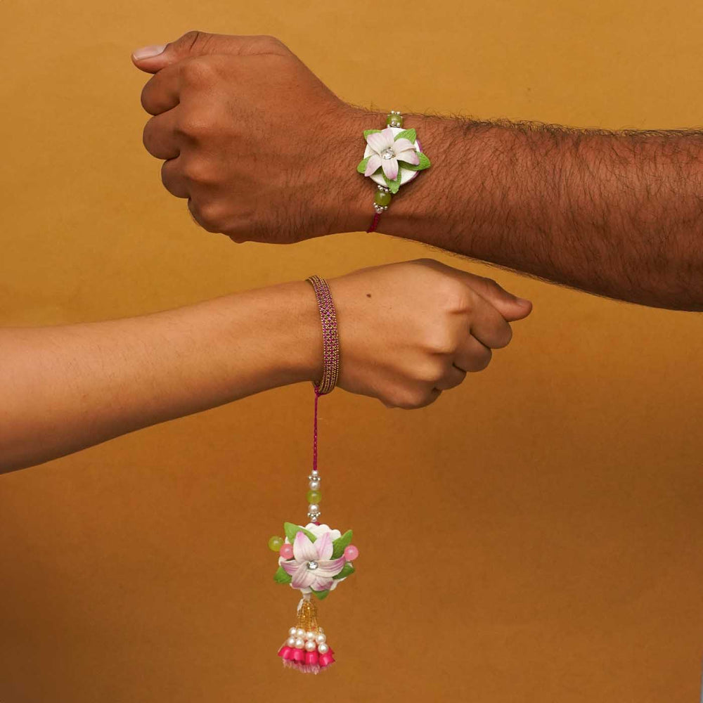 Handmade Lily Clay Bhaiya Bhabhi Rakhi With Chocolates And Roli Chawal Set Of 2 - Worn on Wrists Showing Size