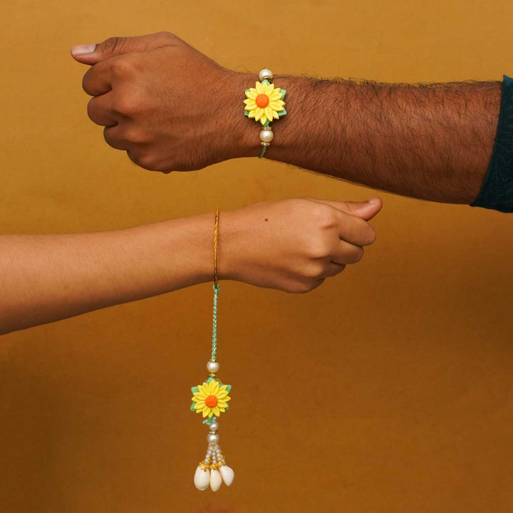 Handmade Yellow Flower Clay Bhaiya Bhabhi Rakhi With Chocolates And Roli Chawal Set Of 2 - Rakhis worn on wrists