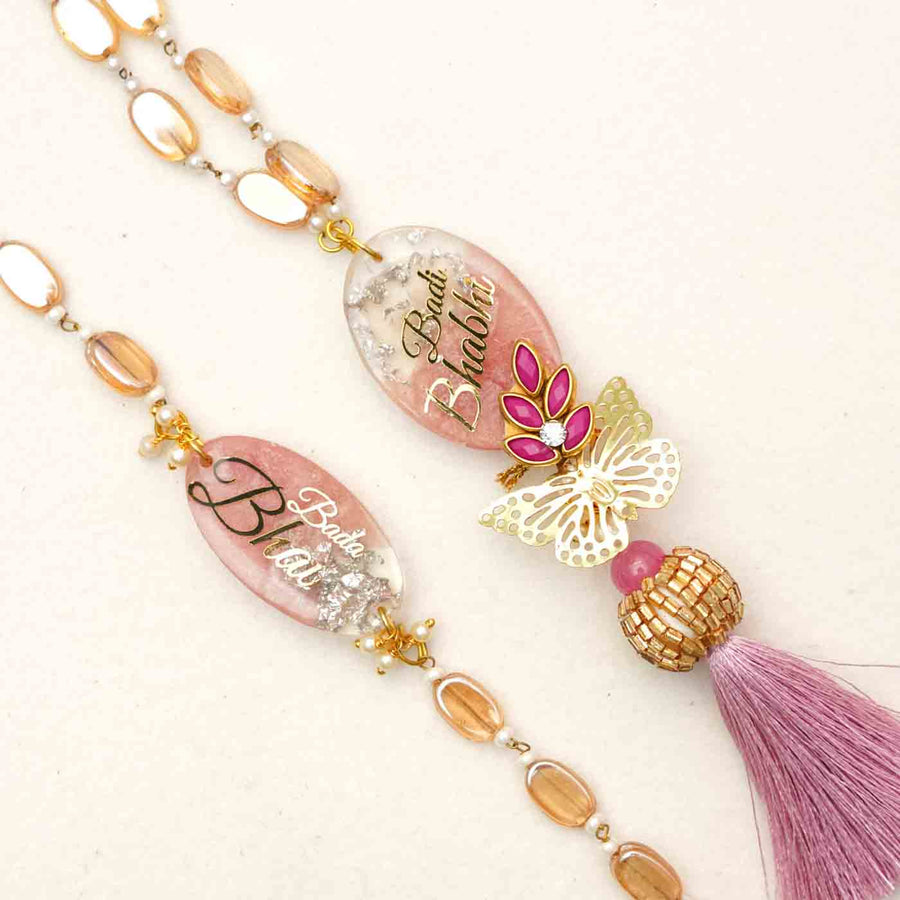 Handmade Resin Bada Bhai And Badi Bhabhi Rakhi With Chocolates And Roli Chawal Set Of 2 - Close-up of two bracelets