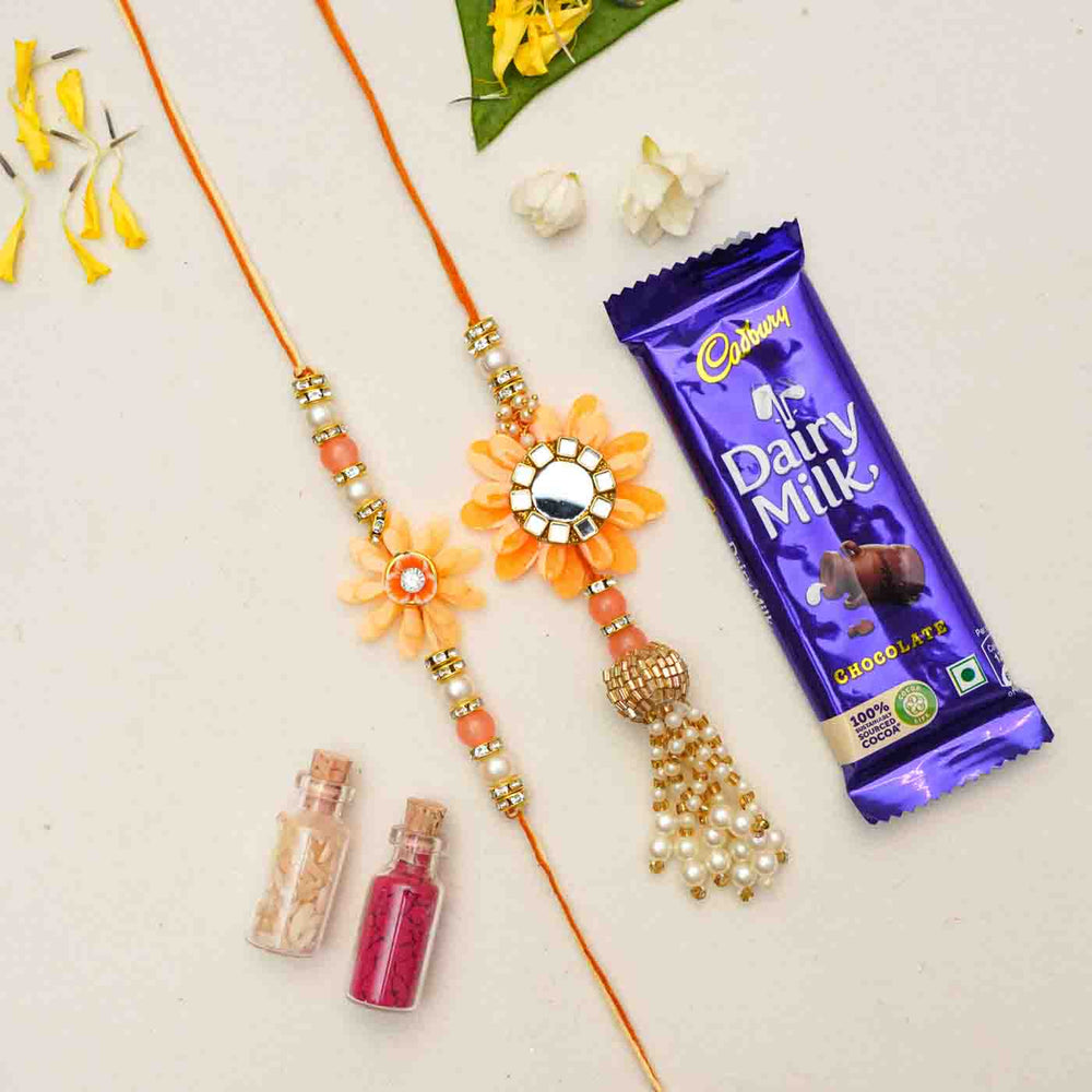 Handmade Resin Peach Flower With Kundan Bhaiya Bhabhi Rakhi With Chocolates And Roli Chawal Set Of 2 - Rakhis with chocolate and colors