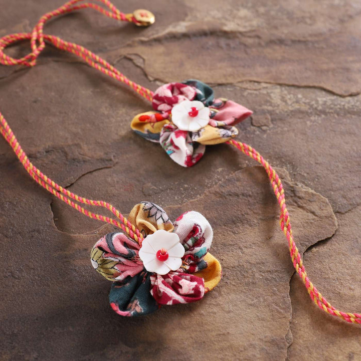 Handmade Fabric Flower Bhaiya Bhabhi Rakhi With Roli Chawal Set Of 2 - Close-up of Fabric Flower Detail