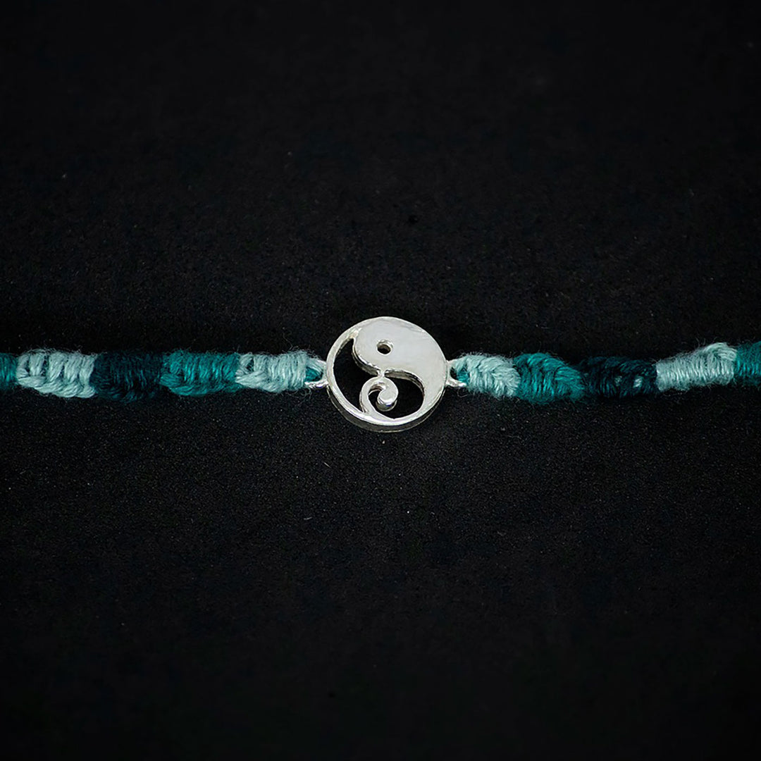 Handmade Gajanana 925 Silver Rakhi With Roli Chawal For Brother - Close-up of Pendant Detail