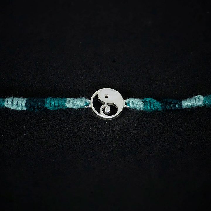 Handmade Gajanana 925 Silver Rakhi With Roli Chawal For Brother - Close-up of Pendant Detail