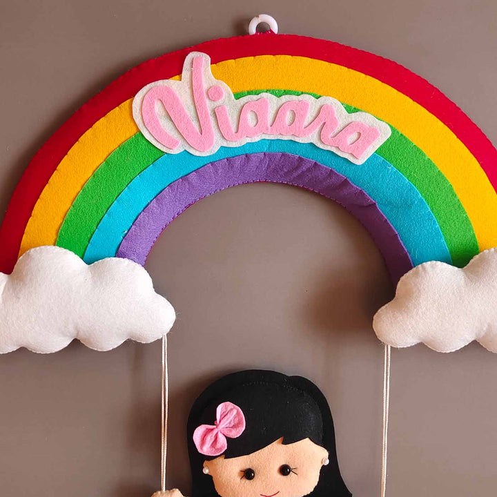 Hand Stitched Girl On Rainbow Themed Round Felt Kids Name Plate For Girls - Hanging Front View with Name Personalization