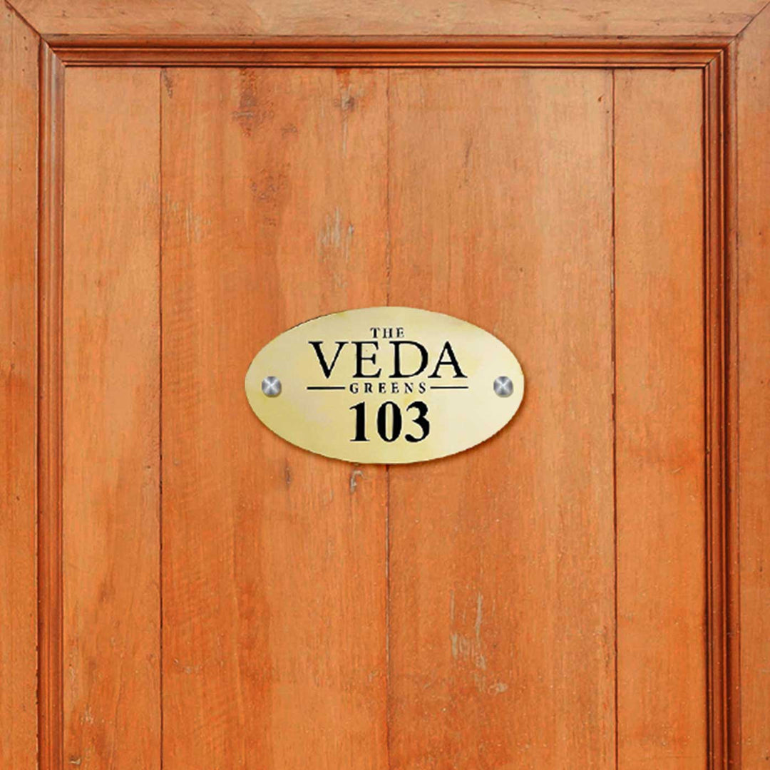 Personalized Waterproof Oval Golden Metal Name Plate - Mounted on Wooden Door Centered