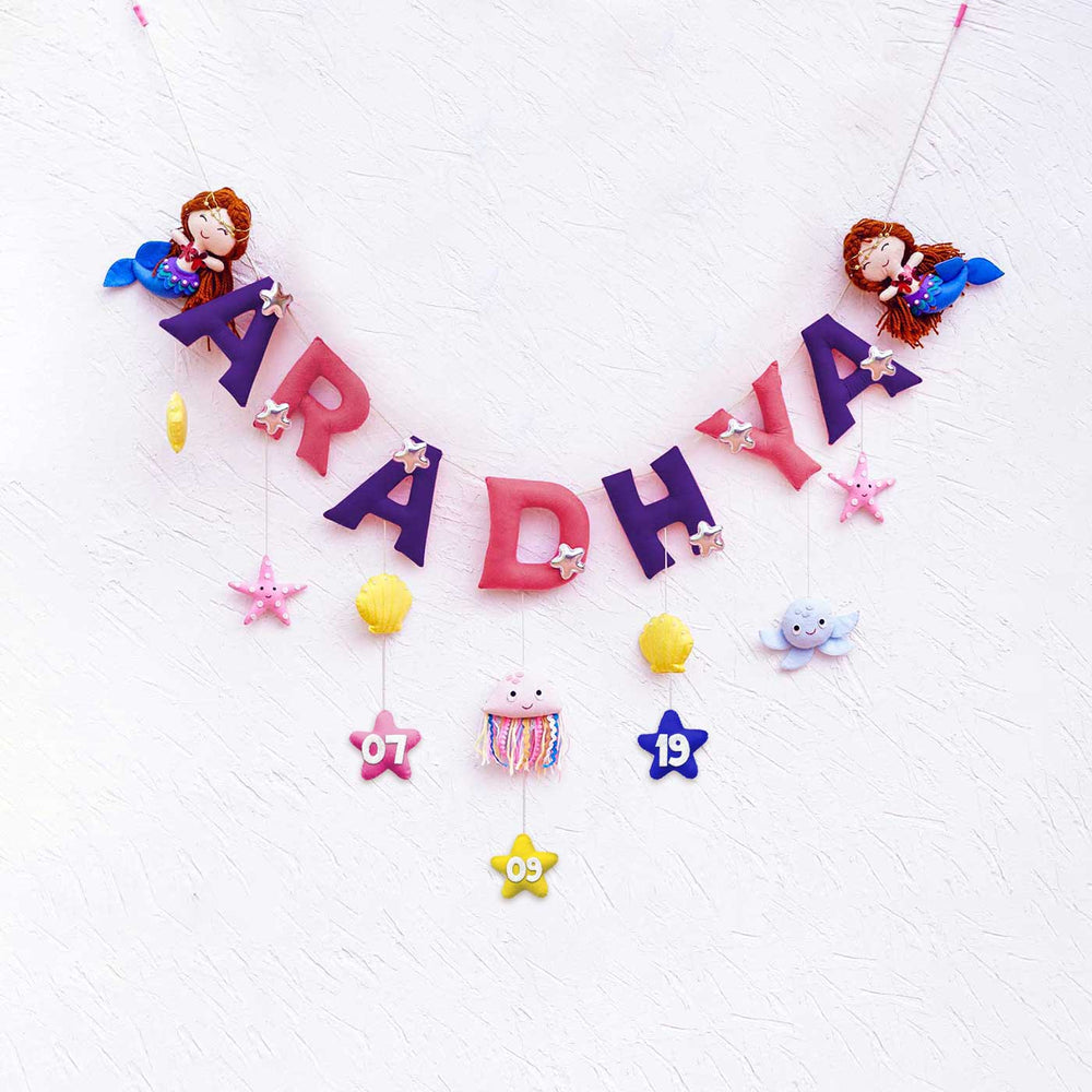 Handcrafted Personalized Themed Bunting For Kids Mystique Mermaid - Front View Hanging Against Wall