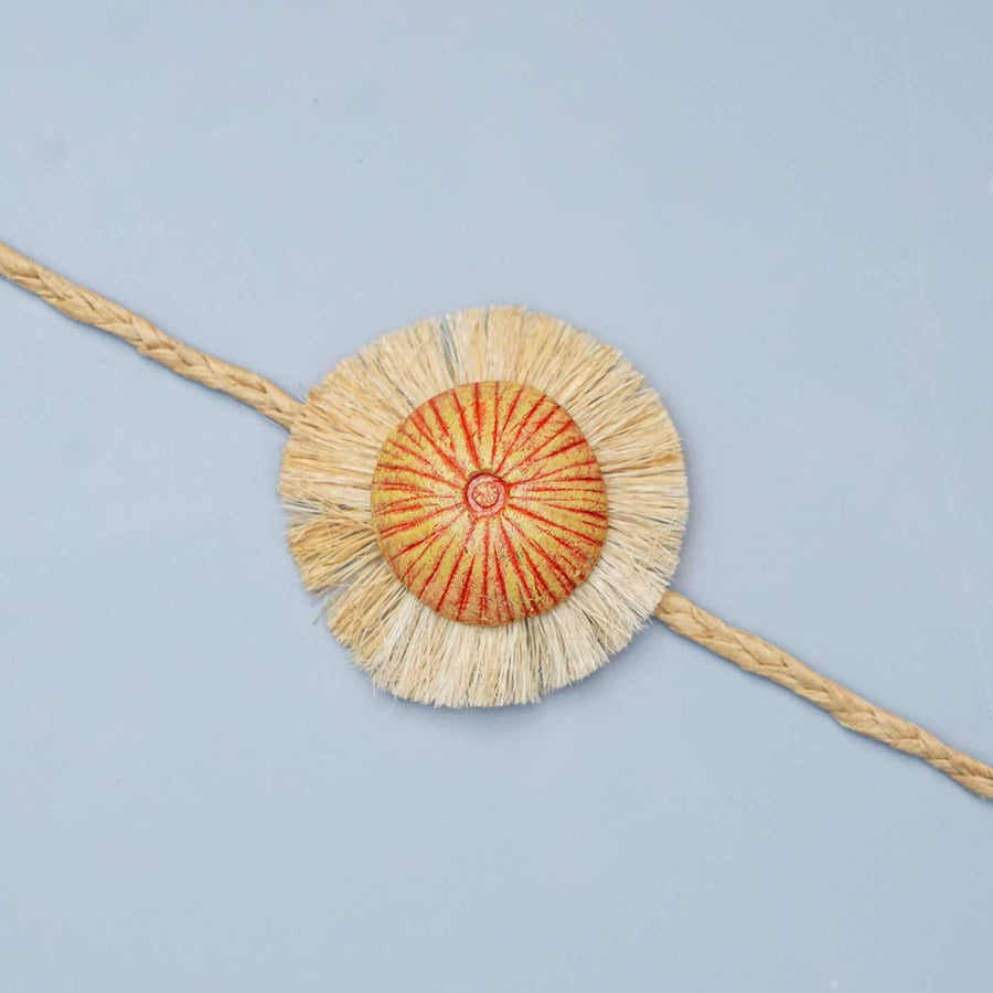 Handmade Papier Mache Rustic Floral Rakhi With Roli Chawal - Close-up of Rakhi design