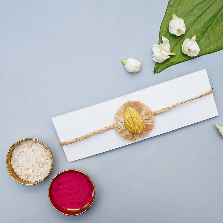 Handmade Papier Mache Yellow Leaf Rakhi With Roli Chawal - Rakhi on Packaging with Accessories