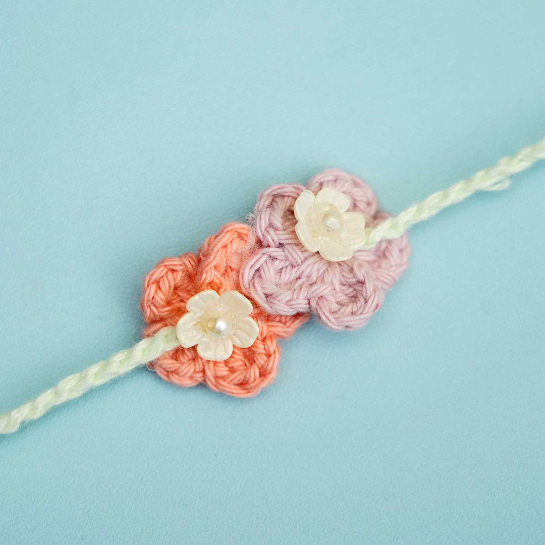 Handmade Crochet Forever Flowers Kids Rakhi With Roli Chawal - Close-up of Crochet Flowers