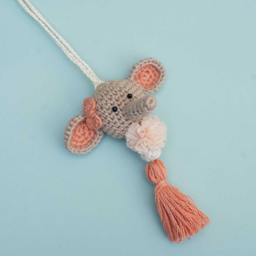 Handmade Crochet Dumbo Kids Rakhi With Roli Chawal - Multiple Products on Display Stand