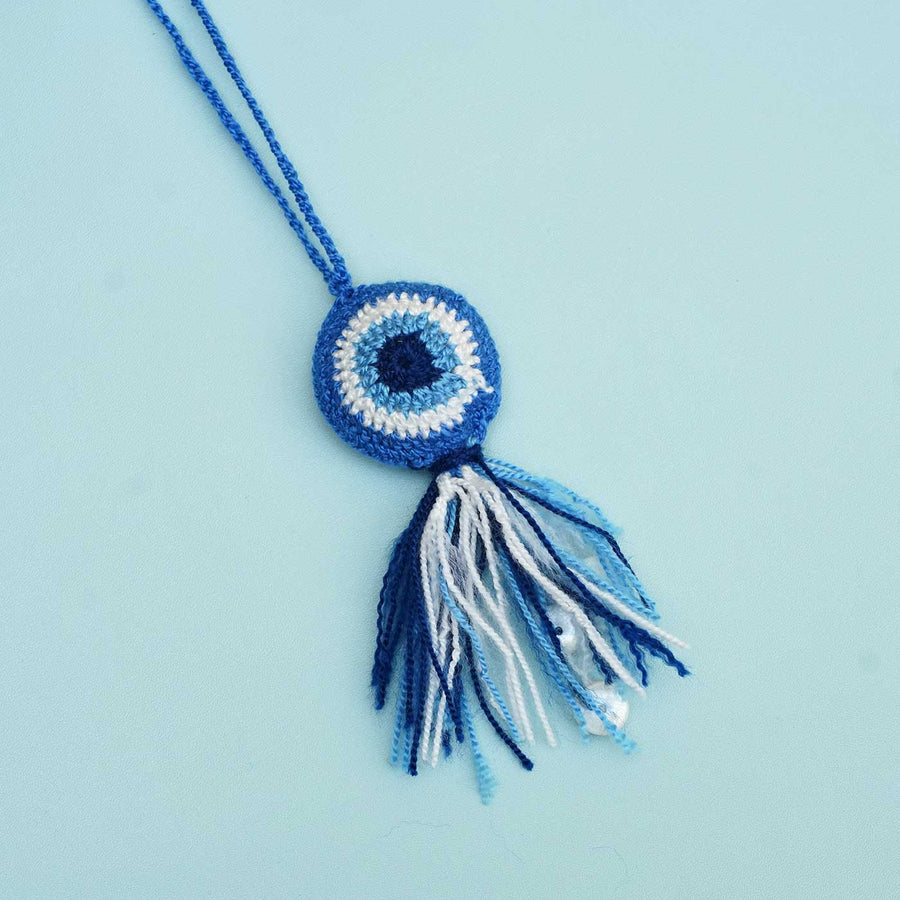Handmade Crochet Evil Eye Kids Rakhi With Roli Chawal - Front View with Tassel