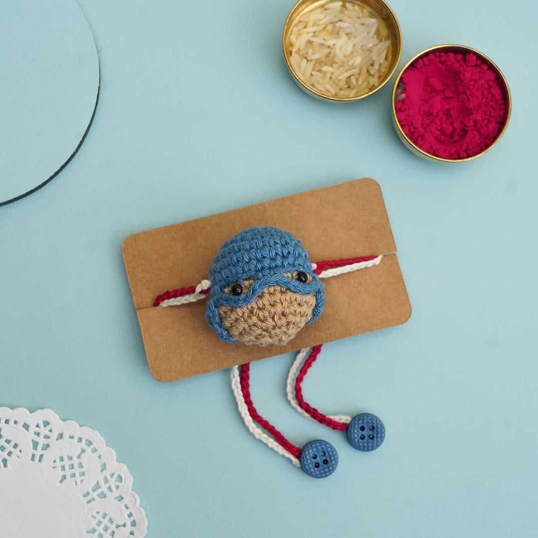 Handmade Crochet Captain America Kids Rakhi With Roli Chawal - On Cardboard Backing