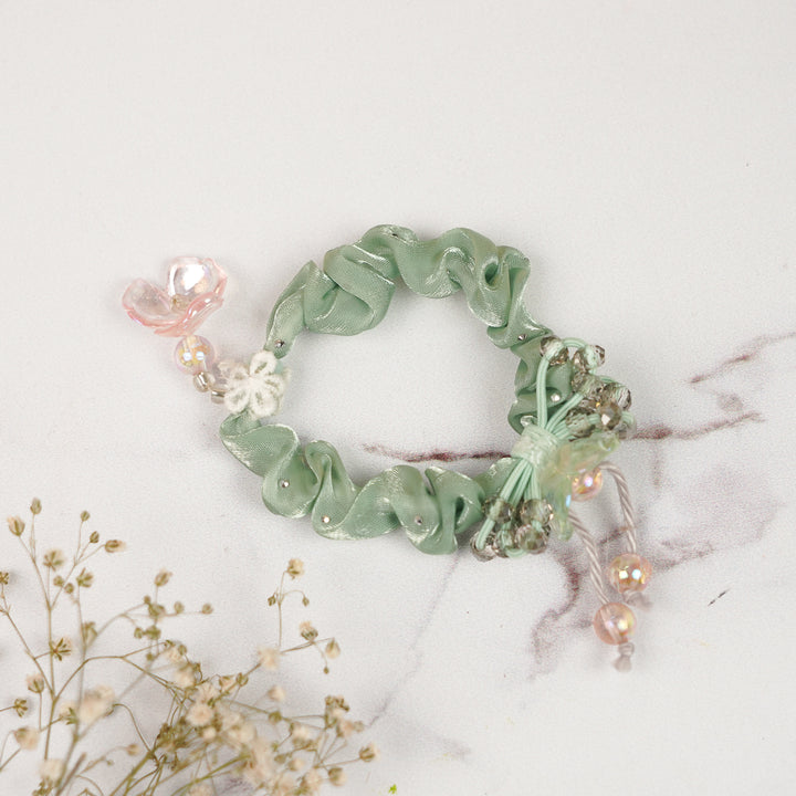 Handmade Stone Embellished Scrunchy Rakhi For Newborns