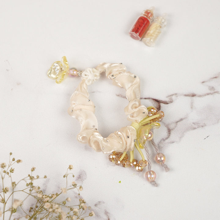 Handmade Stone Embellished Scrunchy Rakhi For Newborns