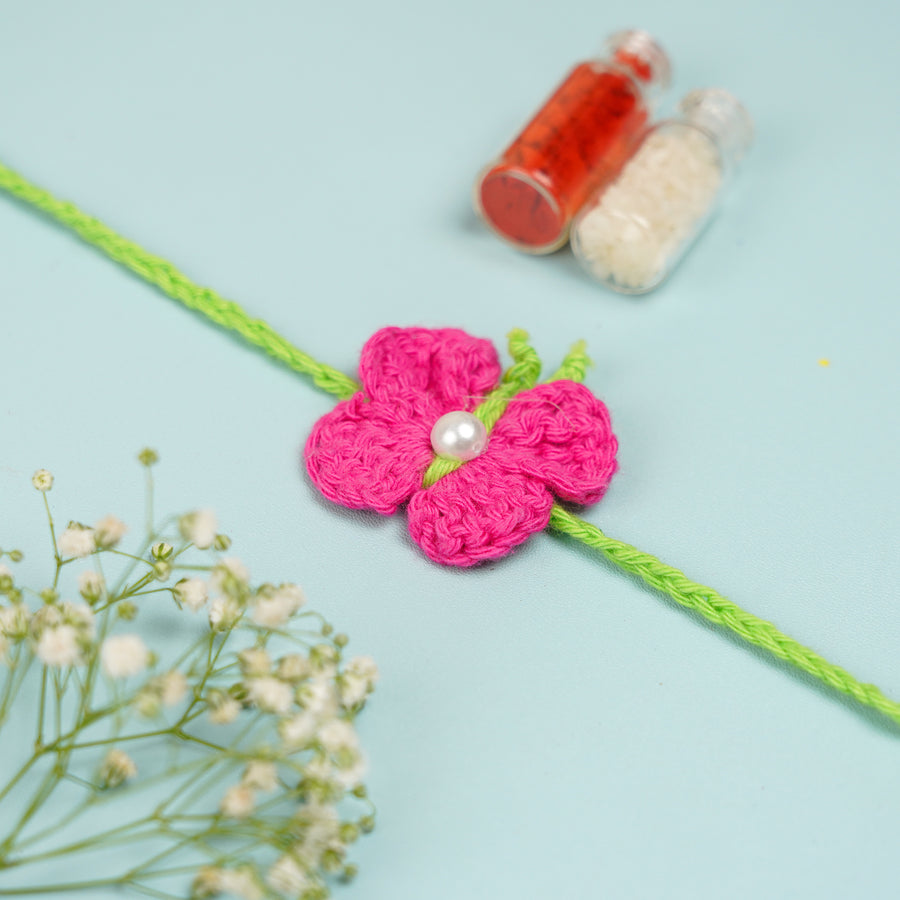 Handmade Crochet Butterfly Theme Rakhi With Roli Chawal - Close-up of Handmade Rakhi