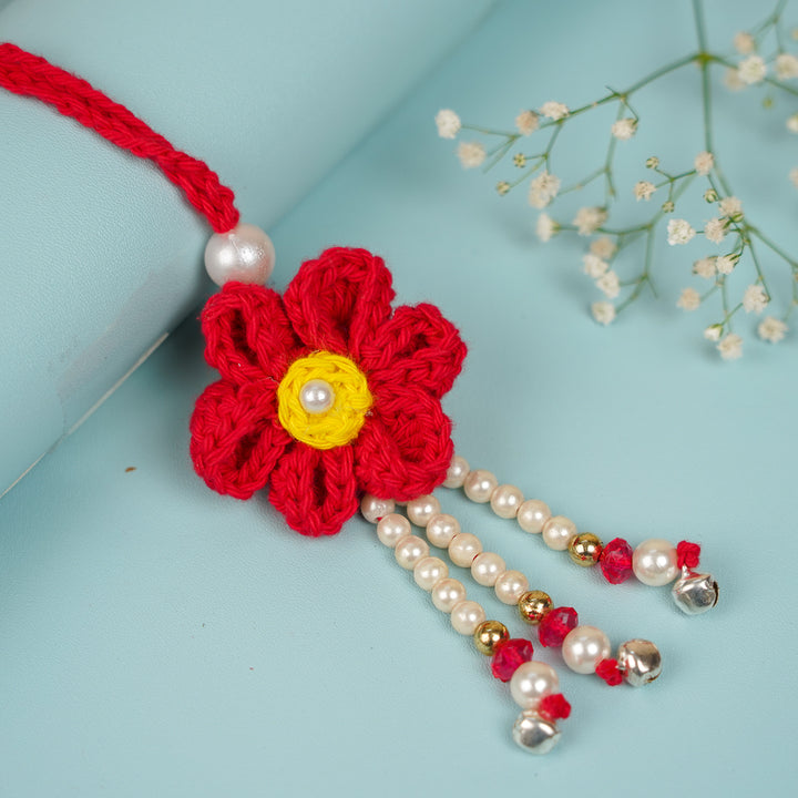 Customized Handmade Crochet Rubi Petal Floral Rakhi With Roli Chawal For Brother - Angled Product Placement