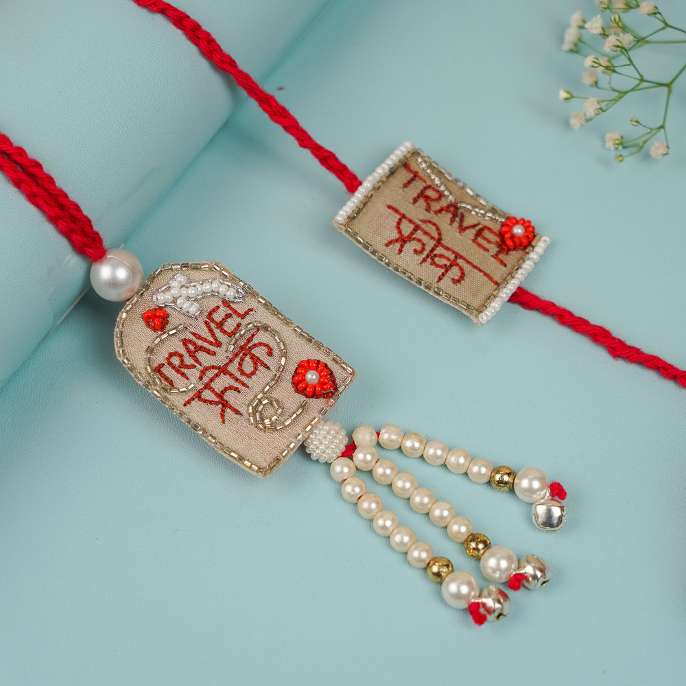 Handmade Beaded Travel Freak Bhaiya Bhabhi Rakhi With Roli Chawal - Close-up Front View