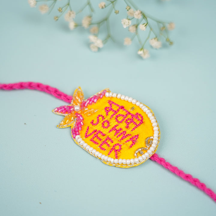 Handmade Beaded Sabse Sona Veer Rakhi With Roli Chawal For Brother - Close-up side angle of Rakhi