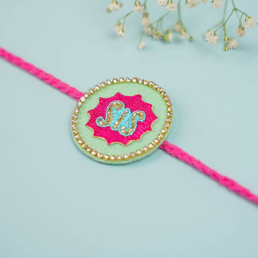 Handmade Beaded Sis Theme Rakhi With Roli Chawal For Sisters - Close-up of Rakhi Detail