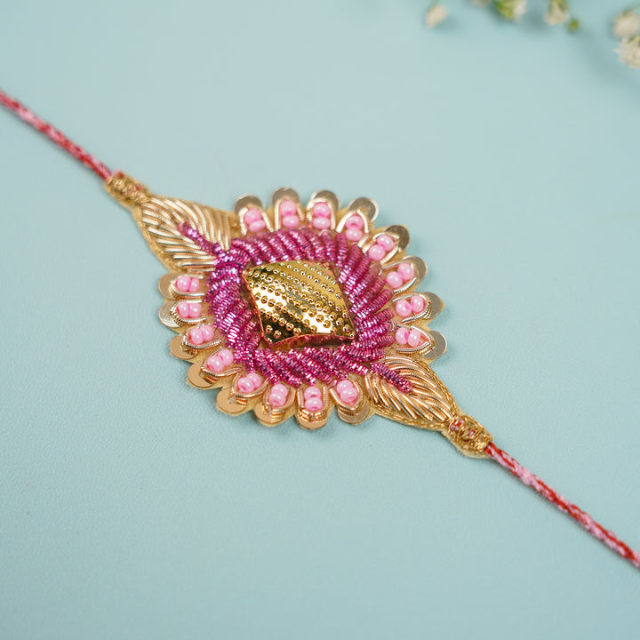 Handmade Gota Patti Design Rakhi With Roli Chawal For Brother And Sisters - Detailed Close-up of Rakhi Centerpiece