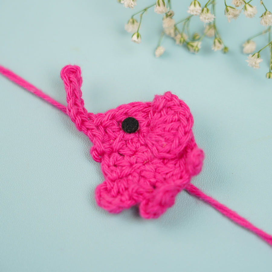 Customized Handmade Crochet Elephant Theme Rakhi With Roli Chawal - Close-up Front View