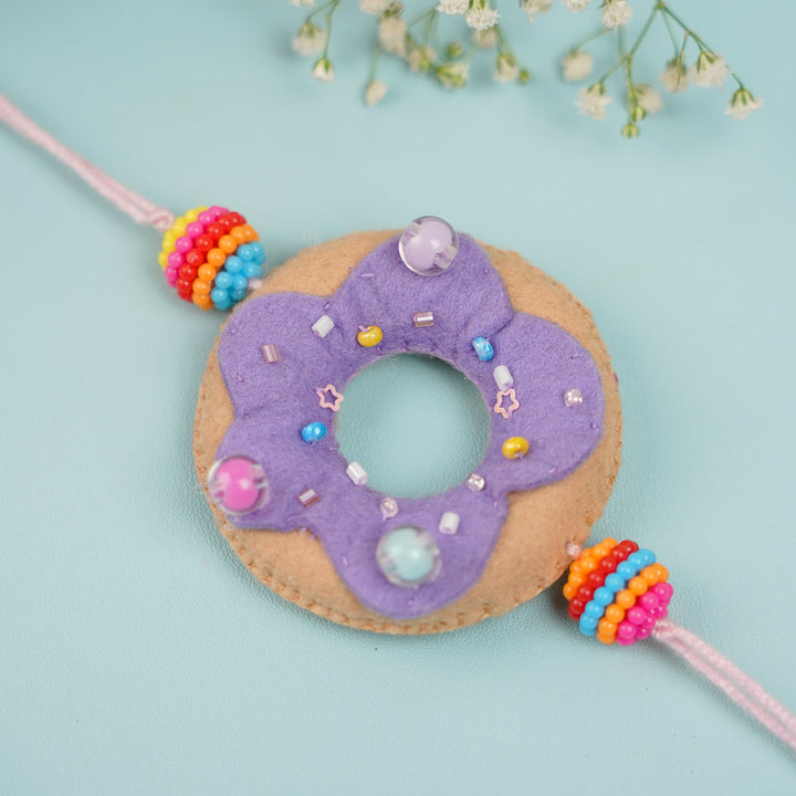 Handmade Doughnut Theme Felt Rakhi With Roli Chawal - Close-up Front View