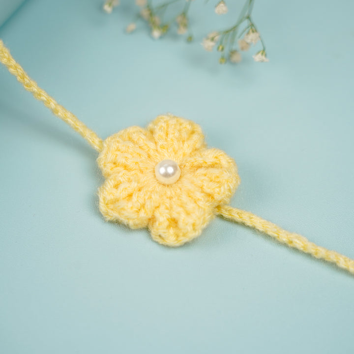 Customized Handmade Crochet Floral Rakhi With Roli Chawal For Brother - Detailed Close-up of Pink Rakhi