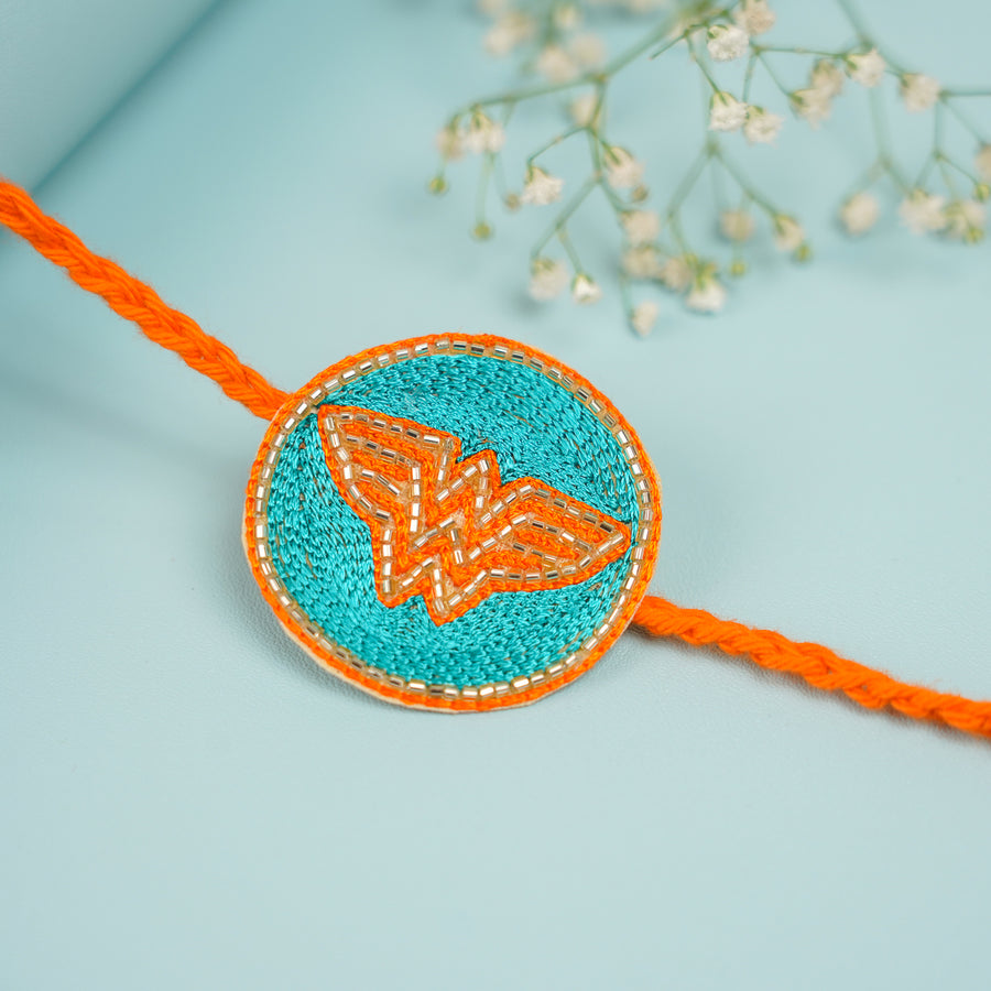 Handmade Beaded Wonder Woman Rakhi With Roli Chawal For Sisters - Close-up of Rakhi Thread Detail