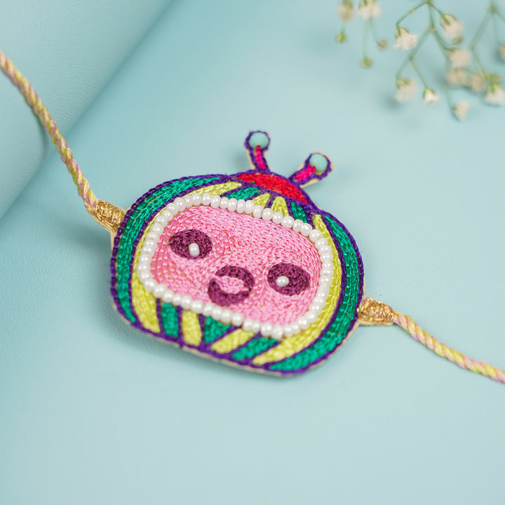Handmade Beaded Cocomelon Theme Kids Rakhi With Roli Chawal - Close-up Front View