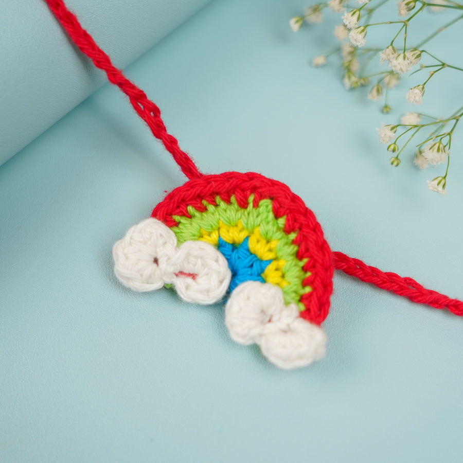 Handmade Crochet Rainbow Rakhi With Roli Chawal - Close-up of Rakhi Thread