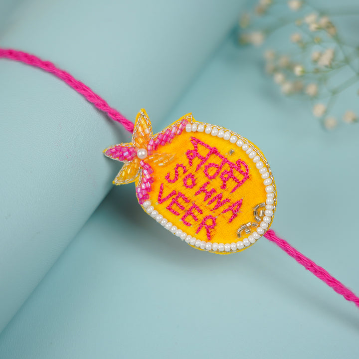 Handmade Beaded Sabse Sona Veer Rakhi With Roli Chawal For Brother - Close-up of Rakhi detail