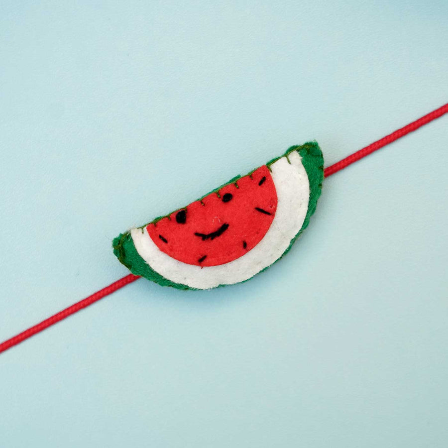 Handmade Watermelon Felt Rakhi With Roli Chawal - Close-up of Watermelon Rakhi