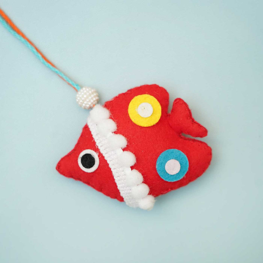 Handmade Fish Felt Rakhi With Roli Chawal - Close-up Front View