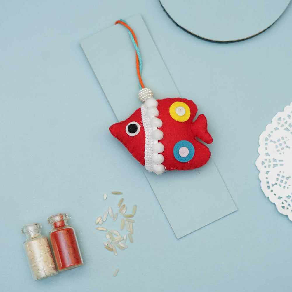 Handmade Fish Felt Rakhi With Roli Chawal - Top View with Props
