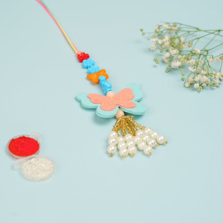 Handmade Buttefly Theme Felt Kids Lumba Rakhi For Girls With Roli Chawal - Top View with Accessories (3)