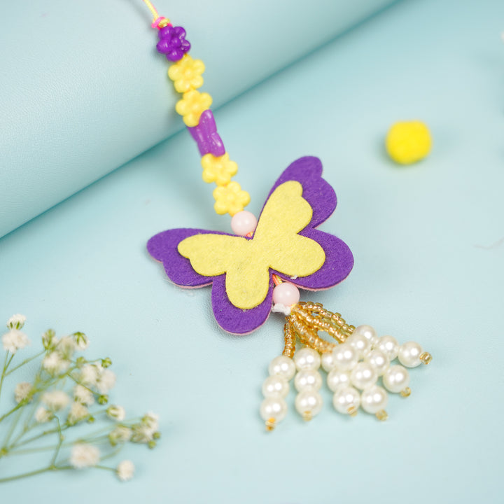 Handmade Buttefly Theme Felt Kids Lumba Rakhi For Girls With Roli Chawal - Close-up of Pendant Detail
