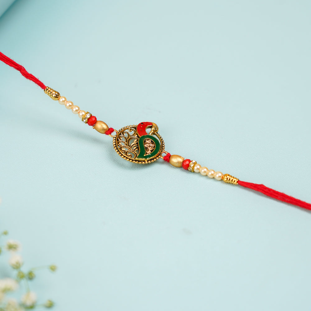 Handmade Peacock Jadtar Bhaiya Bhabhi Rakhi With Roli Chawal Set Of 2 - Single Rakhi Front View